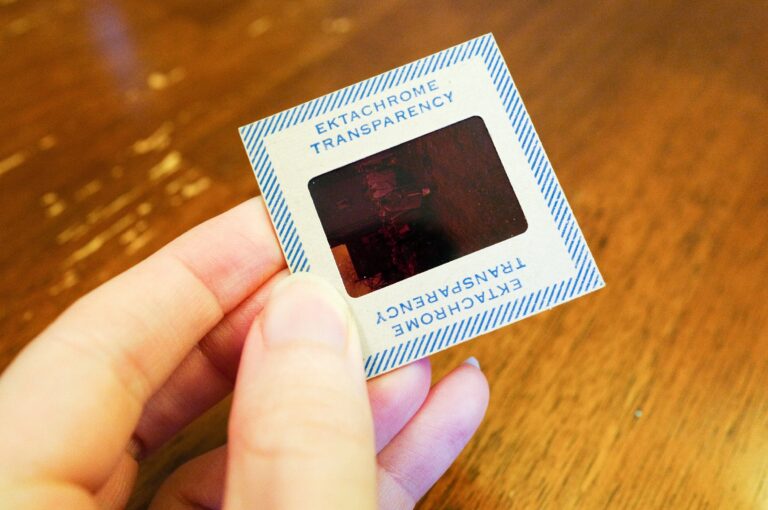 Hand holding an Ektachrome transparency slide