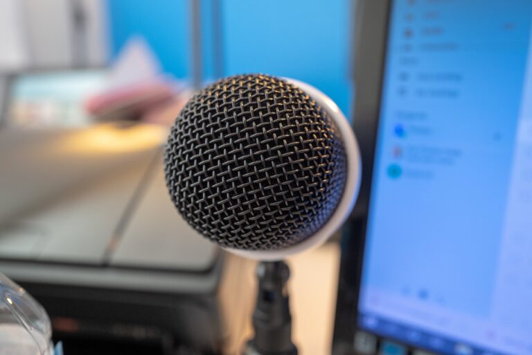 Microphone in front of a laptop screen